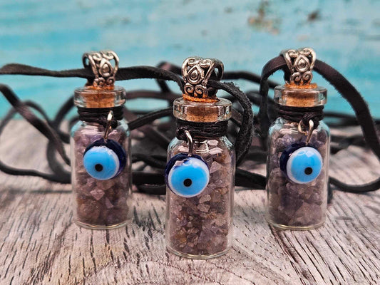 Lookie Here Evil Eye Sapphire Pendants